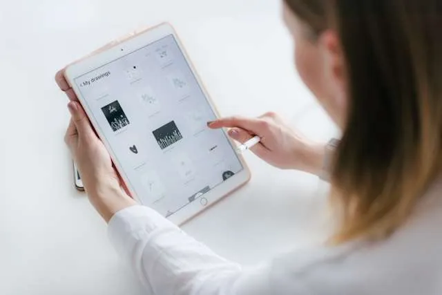 Person using a repaired iPad